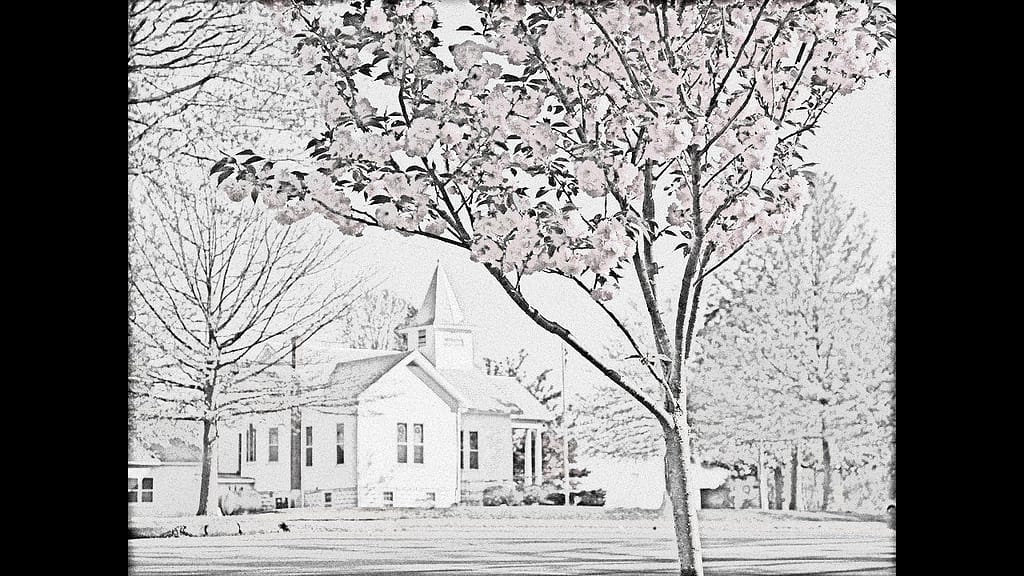 A drawing of the SPUMC sanctuary building, in grayscale, looking Southwards.